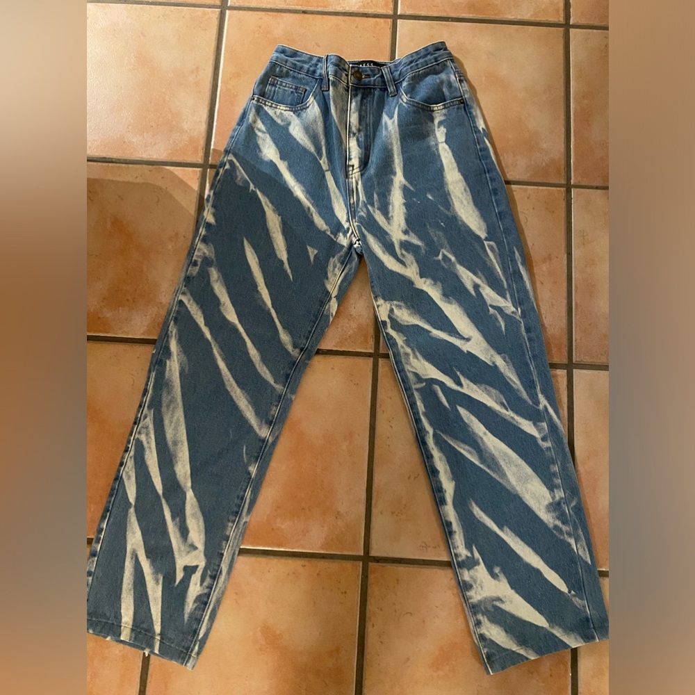Lioness jeans. Used a lot. Very unique